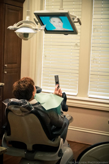 Patient watching operatory TV during dental exam at Reich Dental Center 